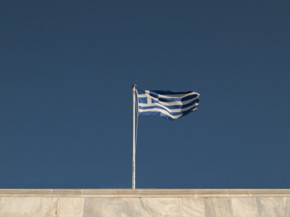 blue and gray flag on rooftop