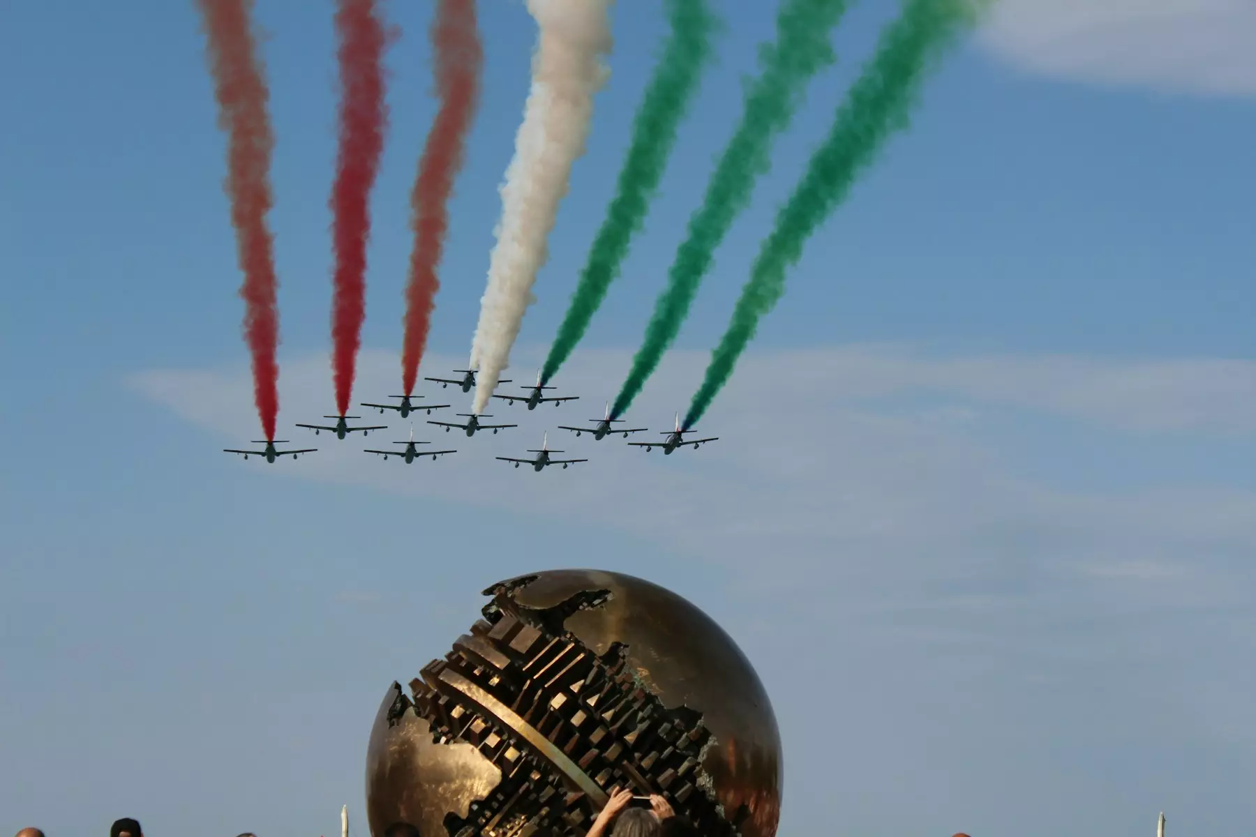 a group of airplanes flying in formation in the sky