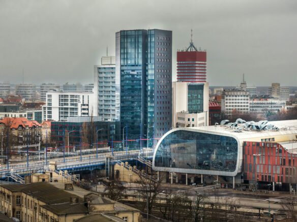a view of a city with tall buildings and a bridge