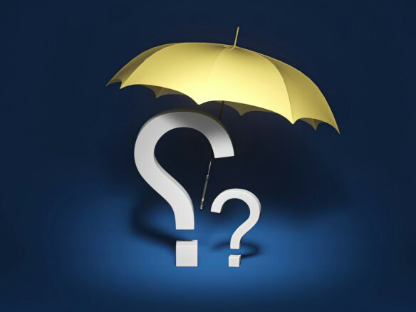 a yellow umbrella with a question mark underneath it