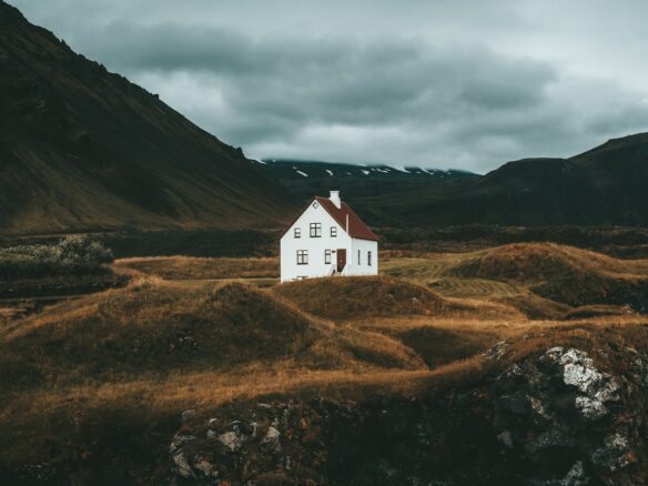 a white house in a valley
