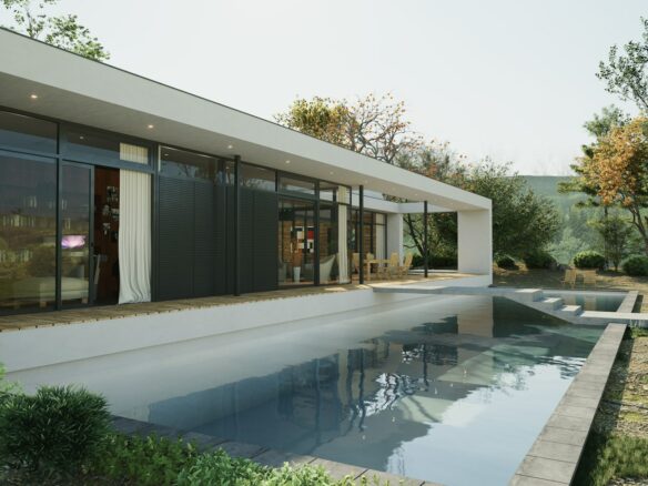 a house with a pool in front of it