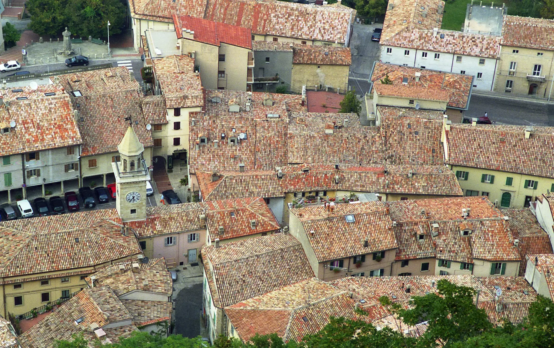 an aerial view of a city with many buildings