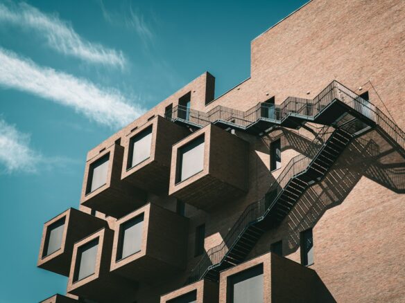 brown concrete building under blue sky during daytime
