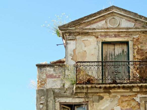 an old building with a balcony and balconies