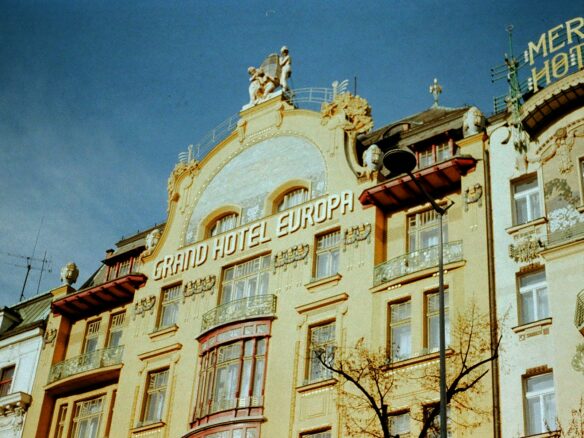 a tall building with a sign on top of it