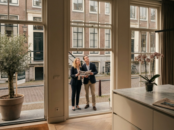 Couple Viewing a Luxury City Home