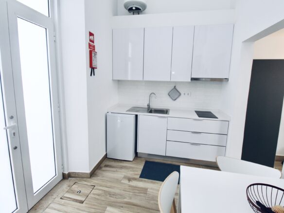 Input: “charming 2 Bedroom Apartment For Sale In Olhão, Algarve, With Balcony And Sea Views”