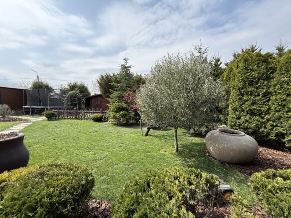 Family Home Of X With Private Wellness Oasis And Landscaped Garden In [location]