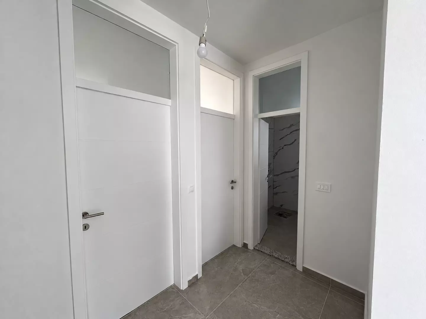 original_1791793938_clean-modern-hallway-with-frosted-transoms-4bb3d8 2-bedroom Apartment In Rogoznica, Croatia (54,58 M²)
