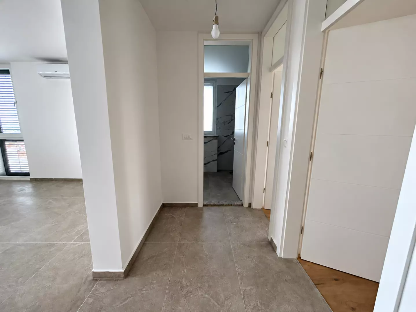 original_1791795359_minimalist-marble-tiled-apartment-hallway-c0afd4 2-bedroom Apartment In Rogoznica, Croatia (59,7 M²)